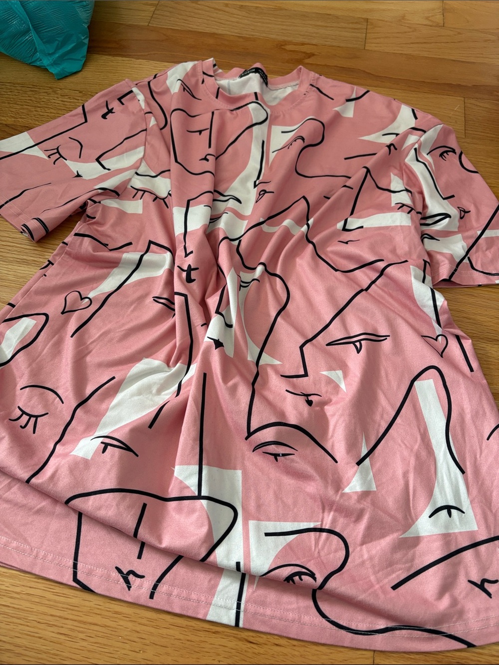 Women’s Pink Abstract Face Print Shirt